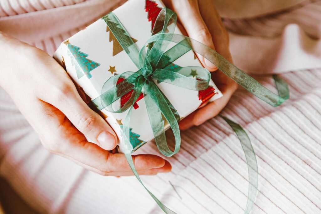wrapped gift held in hands.
